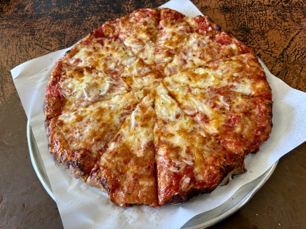 Sabatini's Thick Style Pizza with onions and extra cheese